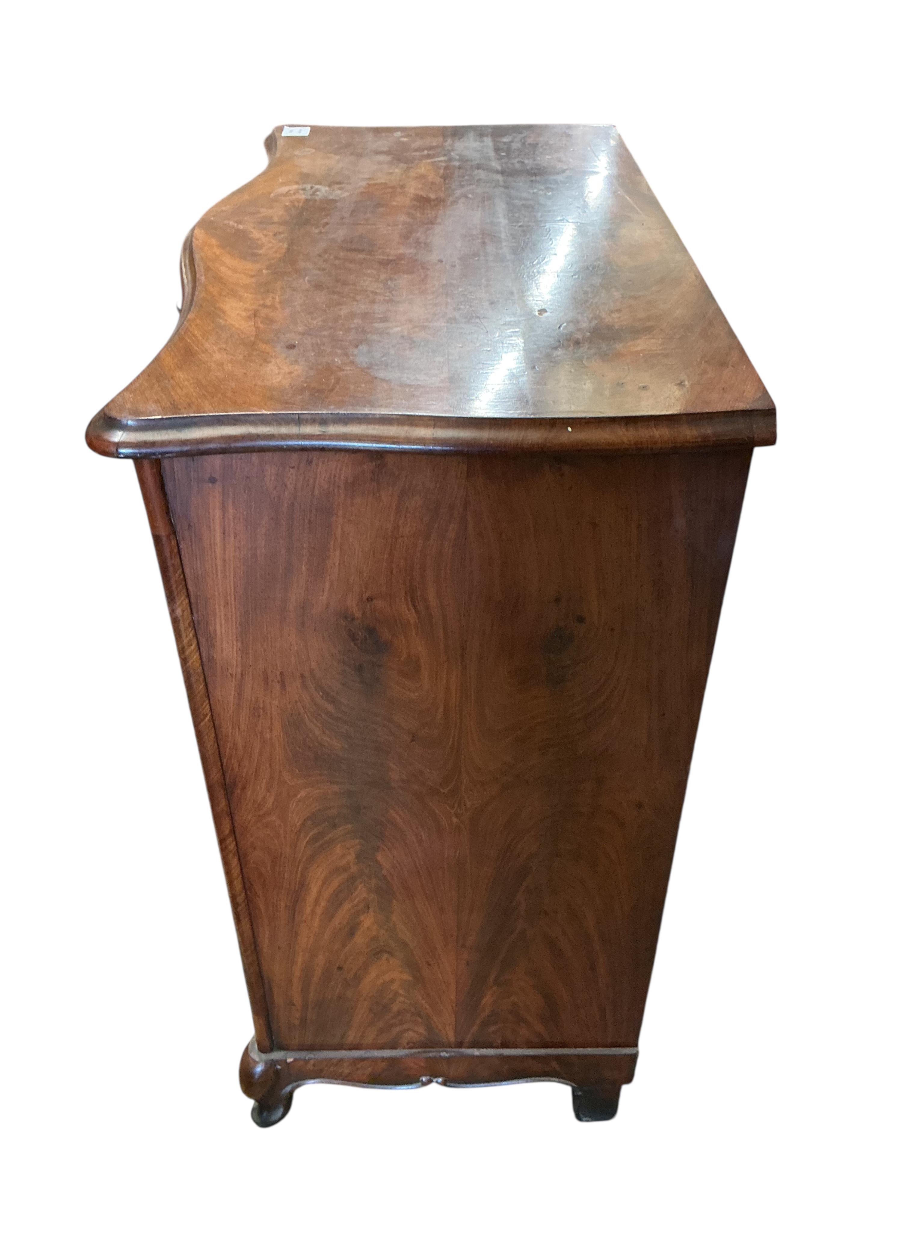 A 19th century French serpentine side cabinet, width 84cm, depth 46cm, height 88cm